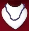 Necklace: Purple Puka Shell