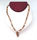 Necklace: Surfboard pendant on coconut shell 